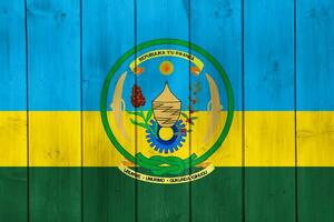 Flag of Republic of Rwanda on a textured background. Concept collage. photo