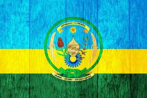 Flag of Republic of Rwanda on a textured background. Concept collage. photo