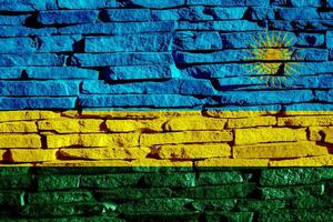 Flag of Republic of Rwanda on a textured background. Concept collage. photo