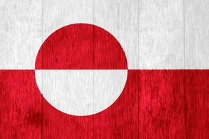 Flag of Administrative divisions of Greenland on a textured background. Concept collage. photo