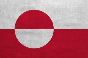 Flag of Administrative divisions of Greenland on a textured background. Concept collage. photo
