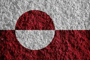 Flag of Administrative divisions of Greenland on a textured background. Concept collage. photo