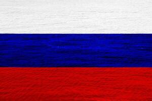 bandera de ruso federación en un texturizado antecedentes. concepto collage. foto