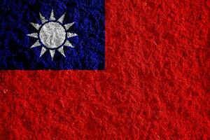 Flag of Republic of China Taiwan on a textured background. Concept collage. photo