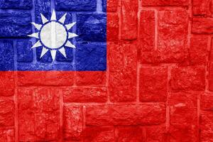 Flag of Republic of China Taiwan on a textured background. Concept collage. photo