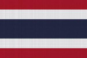 bandera de el Reino de Tailandia en un texturizado antecedentes. concepto collage. foto