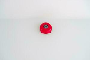 Fire alarm on the wall, powerful emergency equipment safety for apartment photo