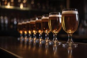 Glasses of beer on the bar counter in a pub or restaurant, Stylish beer glasses full of beer on the bar stand, photo