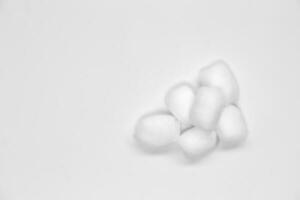 Cotton balls on white background,top view photo