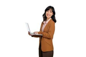 Business, finance and employment, female successful entrepreneurs concept. Professional stylish asian businesswoman fixing project on her way to office, using laptop standing over white background photo