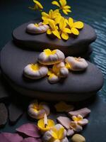 Spa treatment aromatherapy with candles, Stones and flowers for relax wellness photo