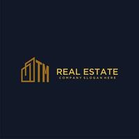 TM initial monogram logo for real estate with building style vector