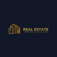 TW initial monogram logo for real estate with building style vector