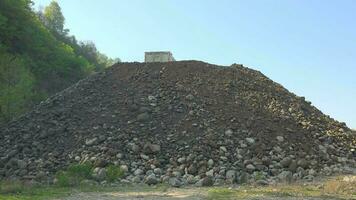 Truck unloads stones and sand video