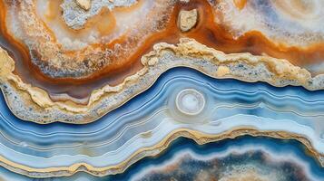 , natural volcanic agate stones close-up light blue, beige and golden texture. Wallpaper background, quartz marble, decorative rock pattern. photo