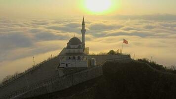 World's highest mosque in mystical and religious ambiance above the clouds video