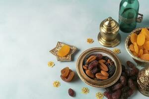 Eid al-Fitr holiday concept with sweet dried dates, fruits and decorations on bright background. Top view from above, generate ai photo