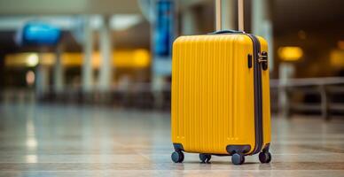 Yellow suitcase, luggage at the airport - image photo