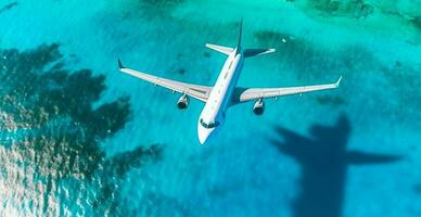 Top down view of white plane flying over blue sea, ocean, travel, vacation concept - AI generated image photo