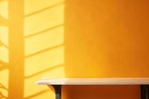 Empty minimal table and yellow texture wall background. Composition mock up for branding product, cosmetic presentation with window shadows on the wall with light reflections. photo