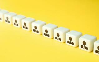 Chain row of people. Human resources and work force. Staffing and recruiting candidates. Building social working relationships. Personnel management photo