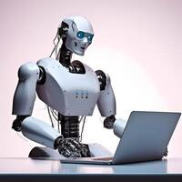 Futuristic robot using computer laptop. photo