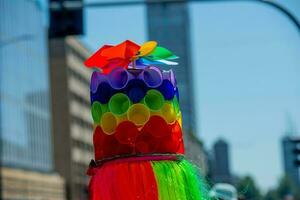 The colorful pride parade in Milan with happy people and to love freely photo