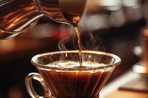 Alternative coffee brewing method,pure over,glass teapot on wooden tray with brewed coffee on dark background. photo