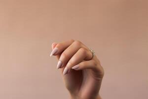 Closeup of woman hand with perfect nude manicure. AI Generated photo