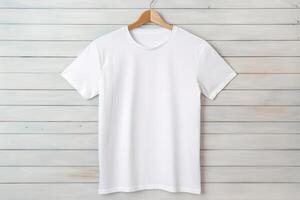 White tshirt mockup on hanger on wooden background, photo