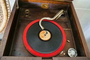 Vintage and Antique Record Player inside the colonia house dated back in 1870s located in the craft village, Mahe Seychelles photo