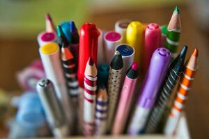 Pen, crayon,marker and pencils,daughers art material at home photo