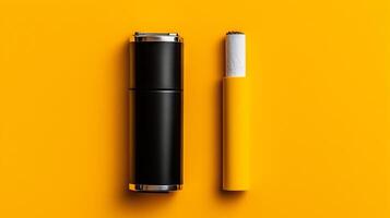 Cigarette and electronic tobacco smoking system isolated on yellow background. Top view. . photo