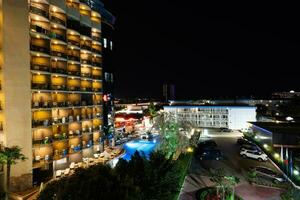 Night view of the Smartline Meridian Hotel from the balcony of Dunav hotel in Sunny Beach, Bulgaria. photo