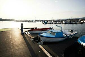 Fishing boats on the pier in the port of Nessebar. photo