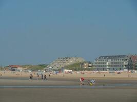 the beach of De Haan at the north sea photo