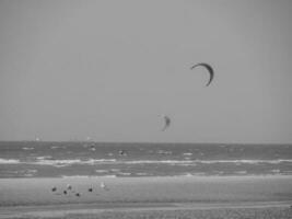 the beach of De Haan at the north sea photo