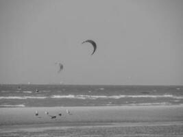 the beach of De Haan at the north sea photo