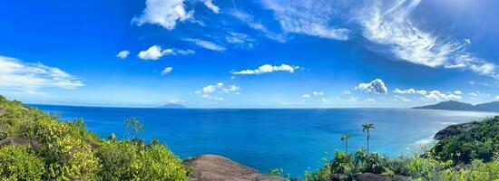 Panoramic view of Anse major nature trail, mountain view, lush national park with granite rocks, Mahe Seychelles photo