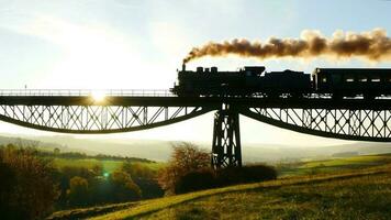 Old Industrial vintage retro steam engine locomotive driving on rails video