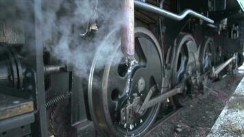 Historical steam engine train locomotive crossing railroad tracks video