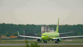 NOVOSIBIRSK, RUSSIAN FEDERATION JUNE 10, 2020 - Boeing 737 of S7 Airlines taxiing on the runway at Tolmachevo airport. Airliner ready to take off. Tourism and travel concept video