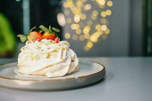 New Year white baked meringue. Christmas bakery background photo