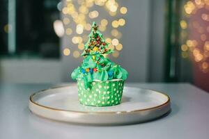 Christmas red Muffin. Background of New Year's cakes photo