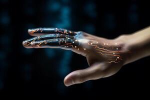 a person is using an artificial hand on their computer with photo