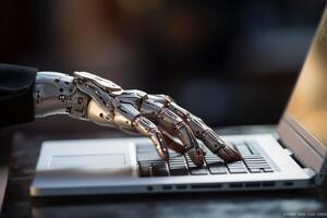 a person is using an artificial hand on their computer with photo