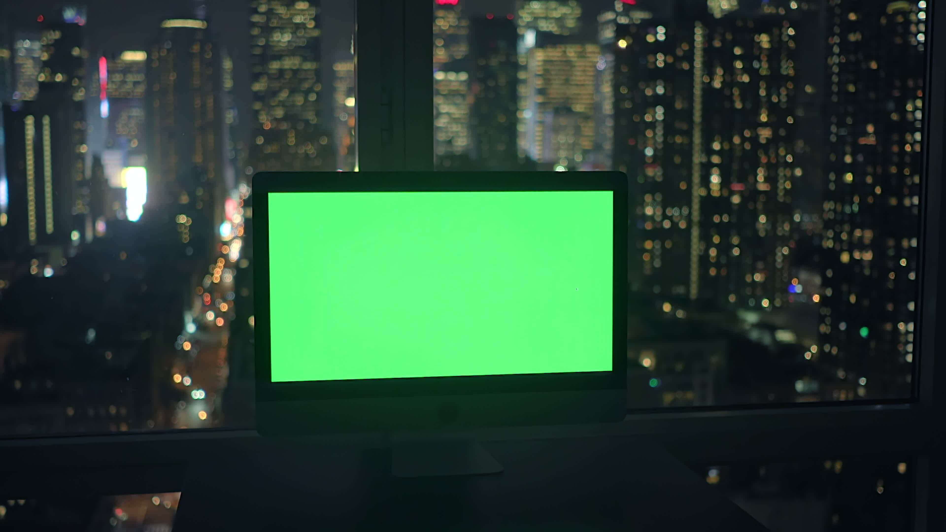 Green screen isolated computer background in city office desk view