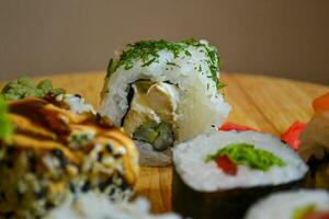 Japanese dinner with sushi rolls photo