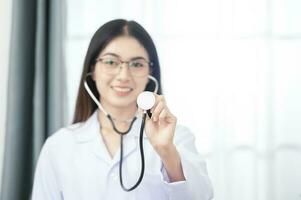 doctor lady patient consultation friendly smile reliable virology clinic crossed arms wearing lab coat white stethoscope isolated gray background photo