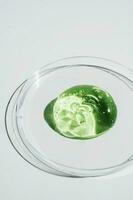 Green gel texture of a cosmetic care product. photo